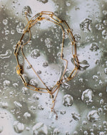 Crystal Clarity: Quartz Marquise (translucent & gold)